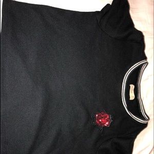 Black shirt with a rose